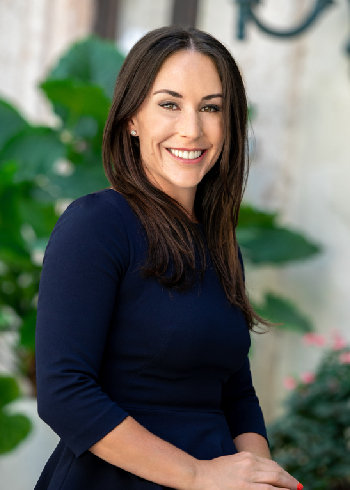 Headshot of Florida equine and business law attorney Grace De La Gueronniere