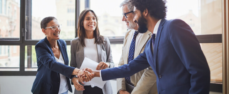 Business people shaking hands over a commercial agreement