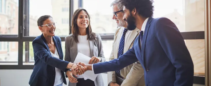 Business people shaking hands over a commercial agreement